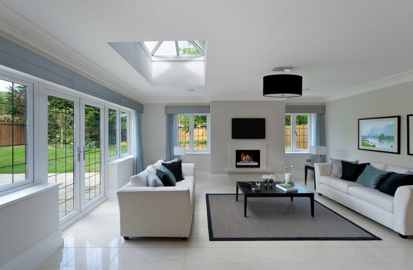 a beautiful, spacious and bright sitting room in an expensive new home.