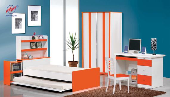 Orange and white bedroom furniture set. Includes bed, desk, wardrobe, shelving, and chair.