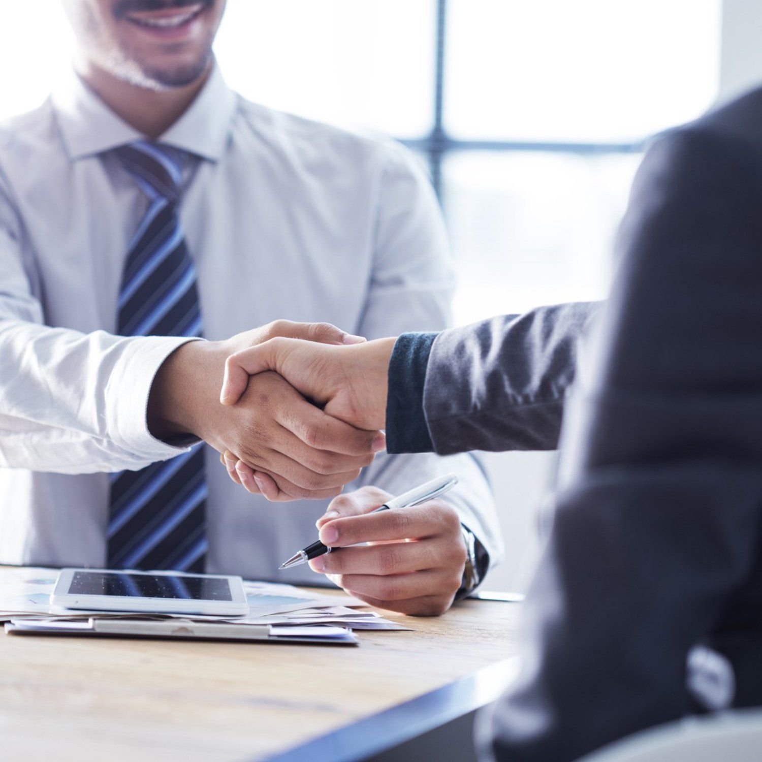 People Shaking Hands — Greenville, TN — Woody Smith Attorney at Law People Shaking Hands — Greenville, TN — Woody Smith Attorney at Law