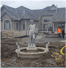 Statue in front of mansion