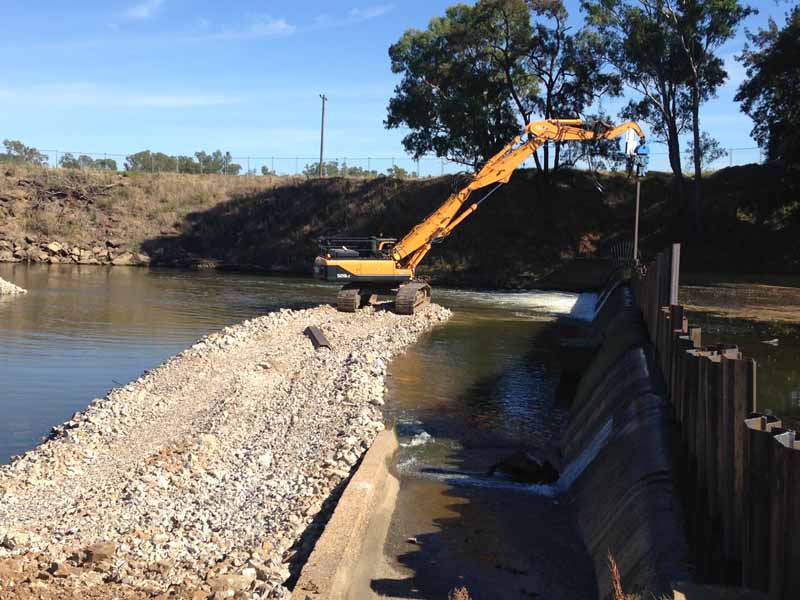 sheet piling equipment by water