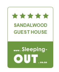 The logo for sandalwood guest house is green and white.