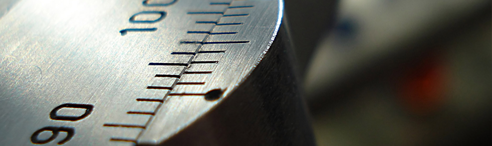 A close up of a metal object with numbers on it.