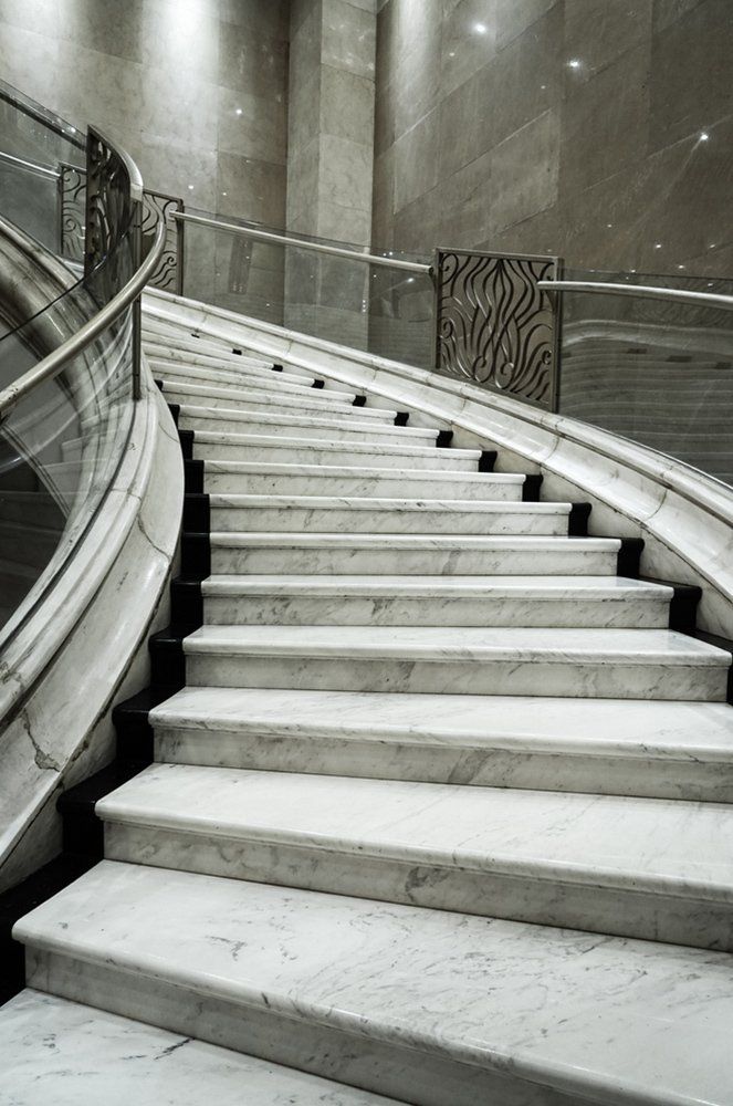 Modern white marble stairs for luxury interior.