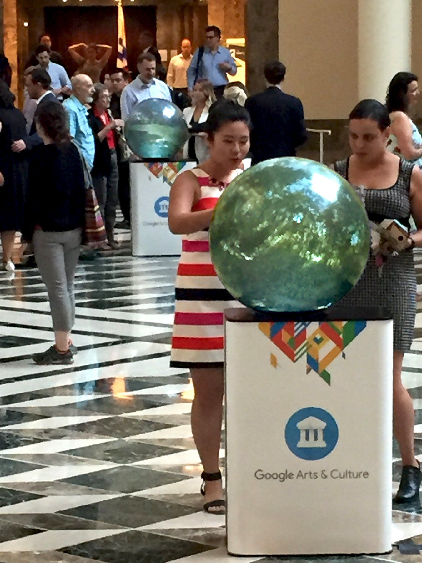 Two Pufferfish Interactive Displays being engaged with by audience.