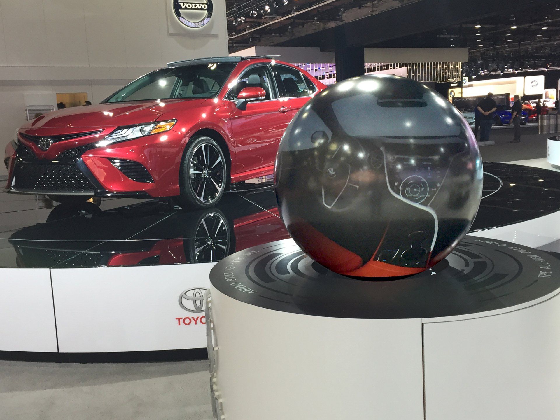 Pufferfish Interactive Sphere in front of Toyota Camry at Detroit Autoshow