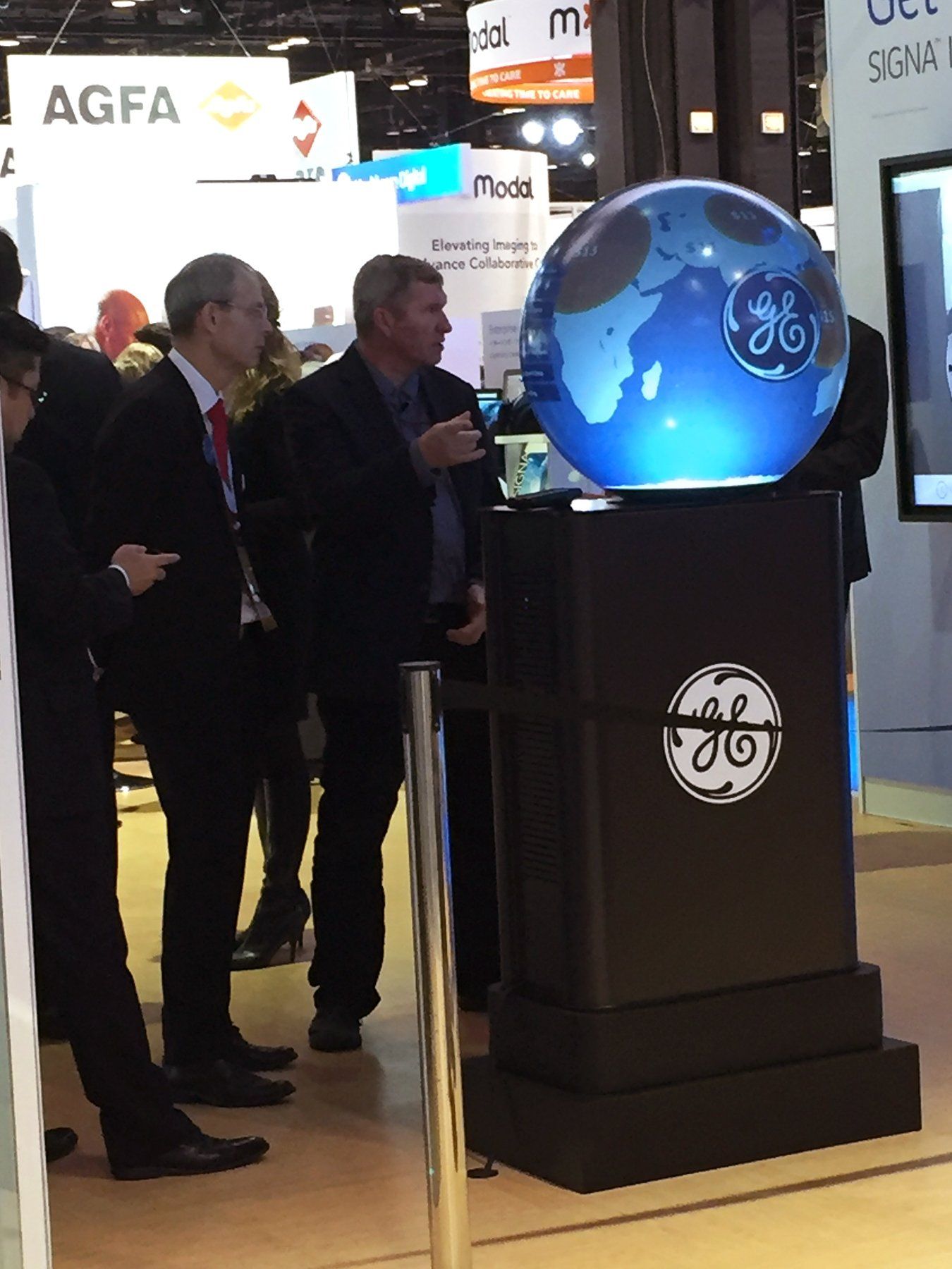 Crowd taking about Pufferfish Interactive Display.