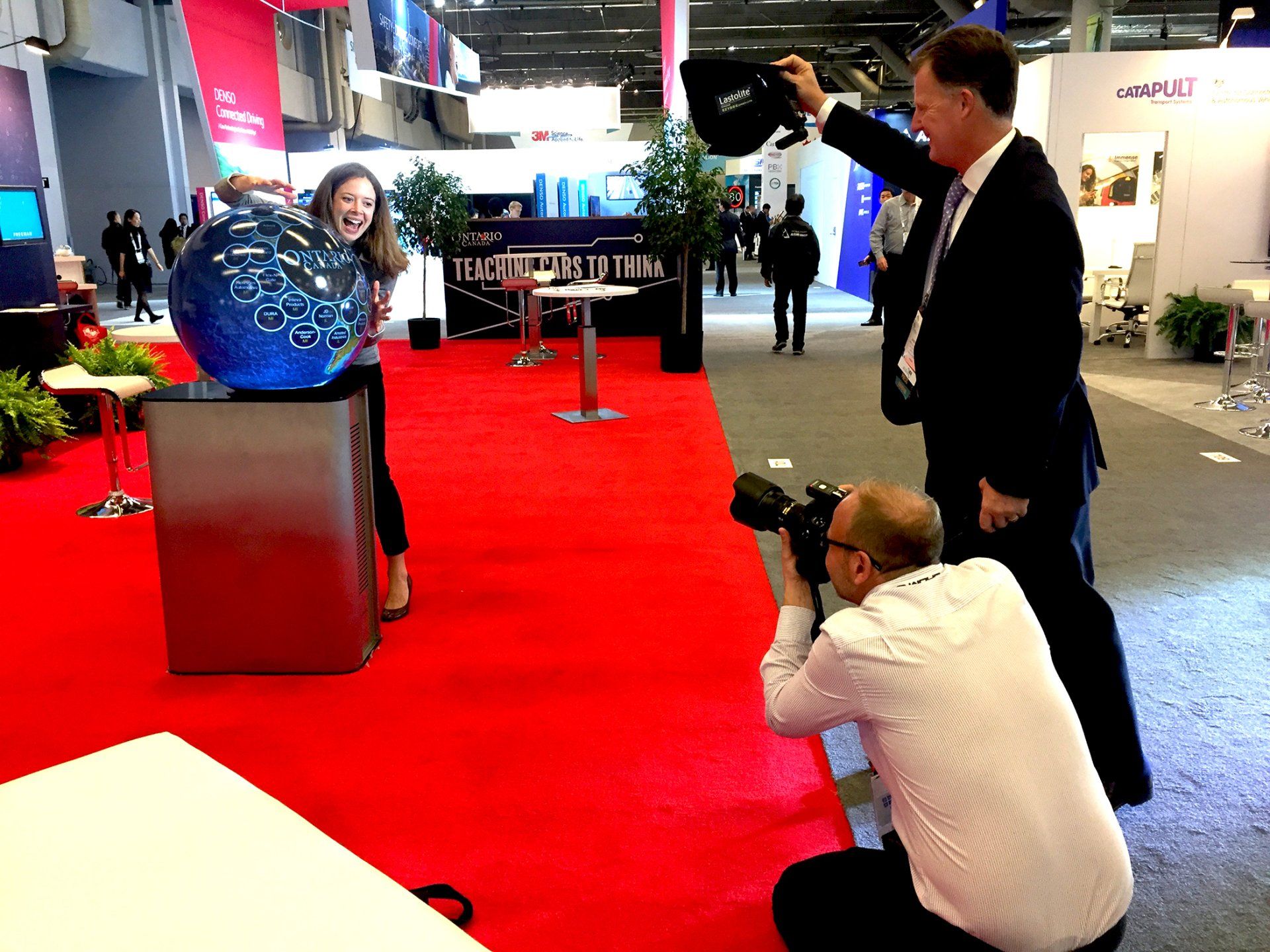 Pufferfish Interactive Display in Ontario Tradeshow Booth receiving media attention.
