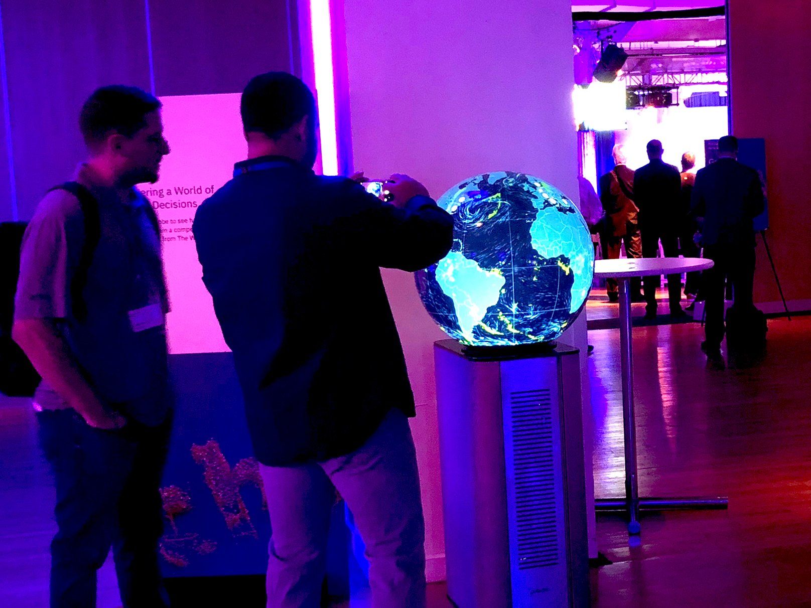 Audience taking photos of Pufferfish Interactive Display.