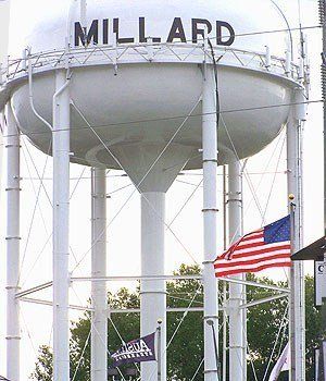 A water tower with the name millard on it