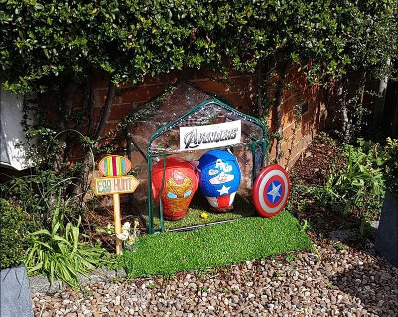 Avengers-themed Easter display: Iron Man, Captain America egg decorations and shield, with