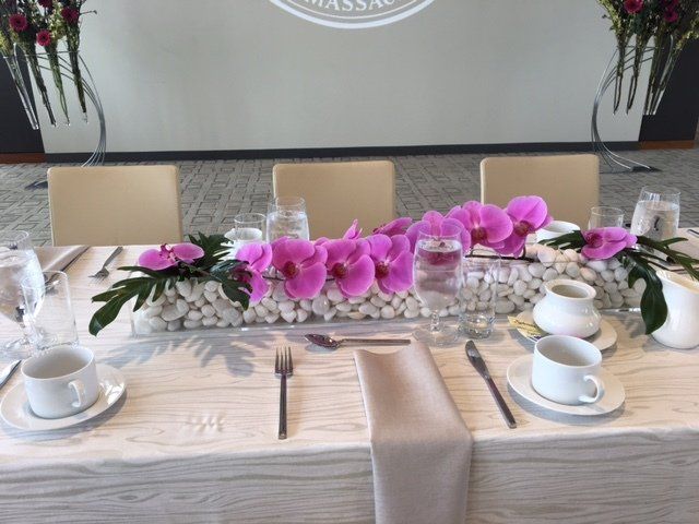 The word massachusetts is on the wall behind the table