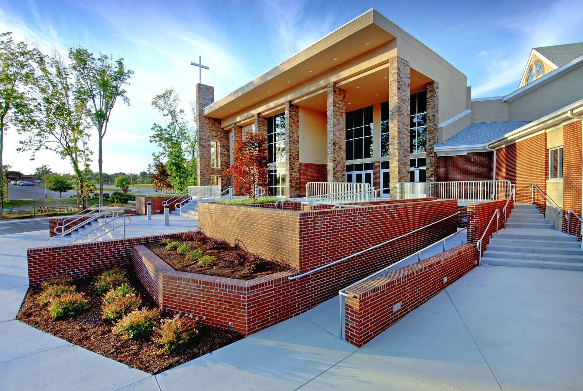 A large building with a cross on top of it