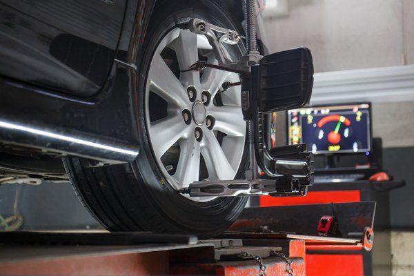 Car wheel alignment process — Valley City, ND — Quality Alignment & Brake Center Car wheel alignment process — Valley City, ND — Quality Alignment & Brake Center