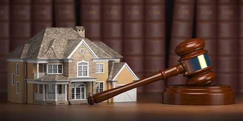 Real Estate Attorney - House With Gravel And Law Books in Asheville, NC Real Estate Attorney - House With Gravel And Law Books in Asheville, NC