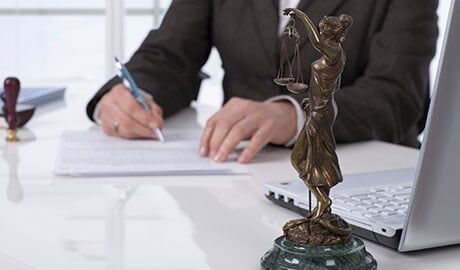 Lawyer Signing Important Document  - Bronx Bankruptcy Lawyer in Bronx, NY