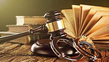 Wooden gavel, law books and handcuff - Criminal Defense in Morganton, NC-LeCroy Law Firm, PLLC Wooden gavel, law books and handcuff - Criminal Defense in Morganton, NC-LeCroy Law Firm, PLLC