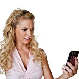 Woman Holding a Cellphone — Scottsdale, AZ — XanderLyn Salon
