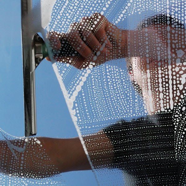 Boone NC window cleaner working