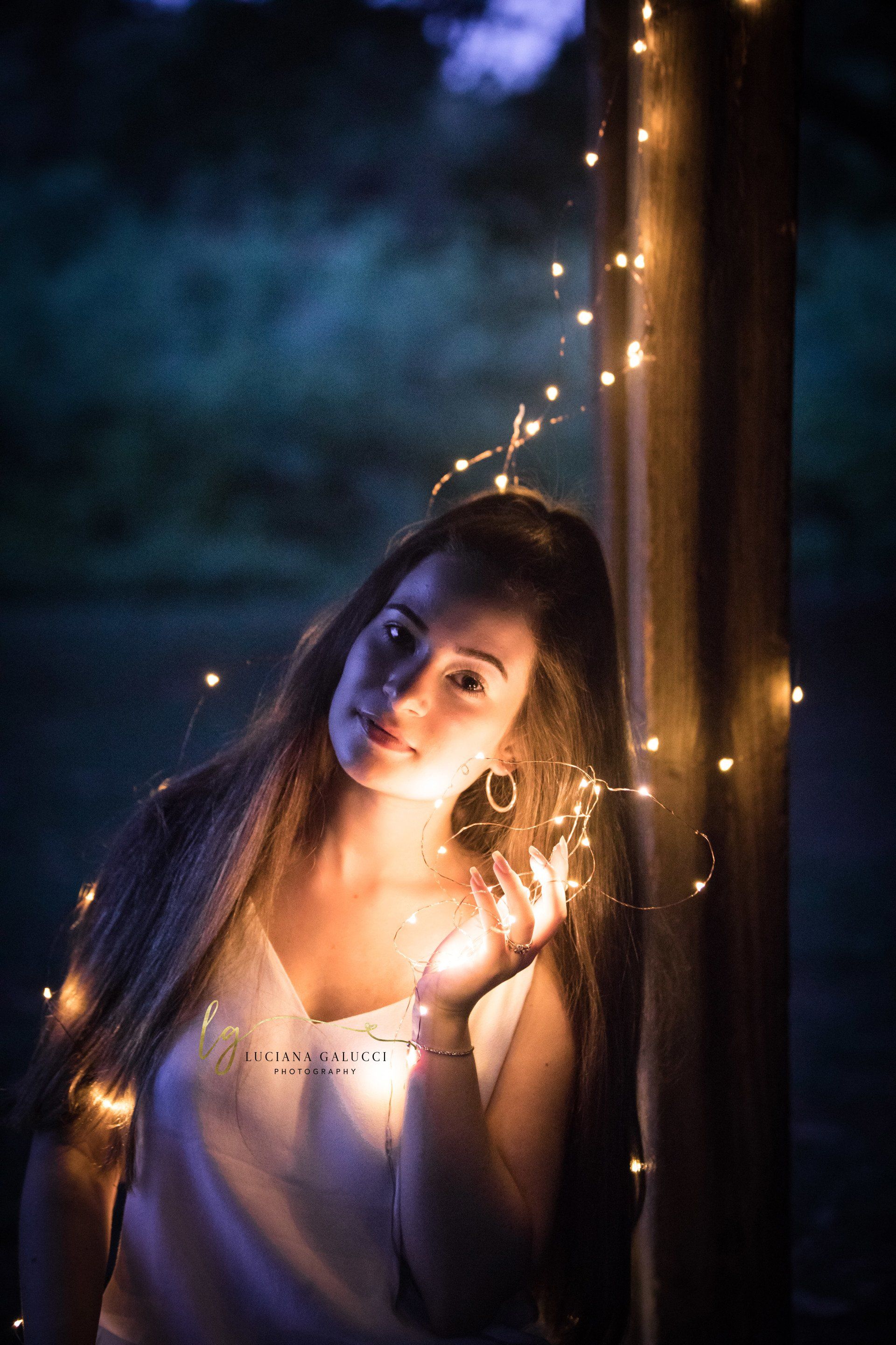 Golden hour senior portrait session in a sunflower field at Dix Park in Raleigh, North Carolina
