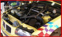 Car Maintenance — Close Up Image Of Engine Of A Car In Jacksonville, FL
