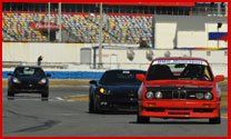 Auto Service And Repair — Front View Of Cars In A Track Field In Jacksonville, FL