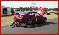 Automobile Service — Man Repair The Red Car In Jacksonville, Fl