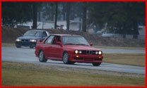 Car Auto Repair — Long Drive Of A Red Car In Jacksonville, Fl