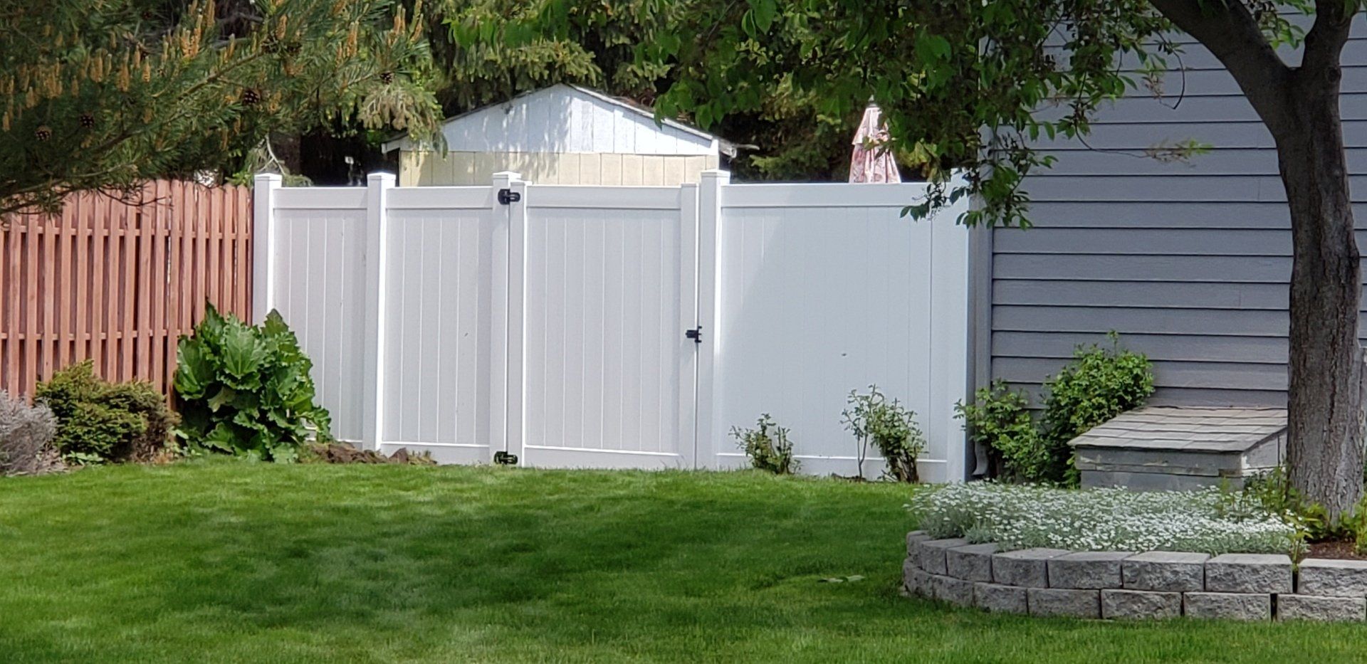 Picture of a beautiful white vinyl fence built by All About Fence in Bend, OR