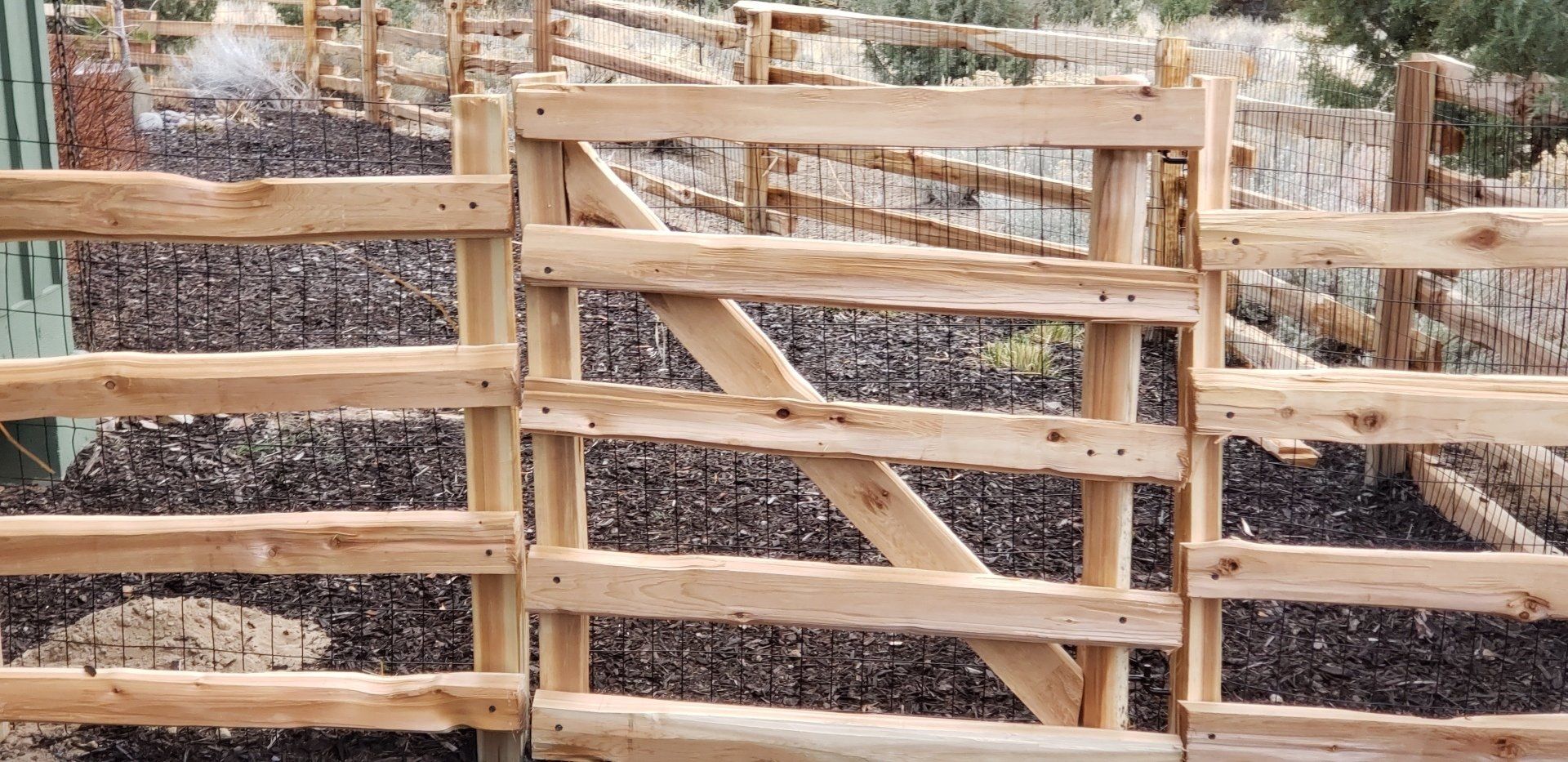Wooden rail fence for ranch and agricultural property