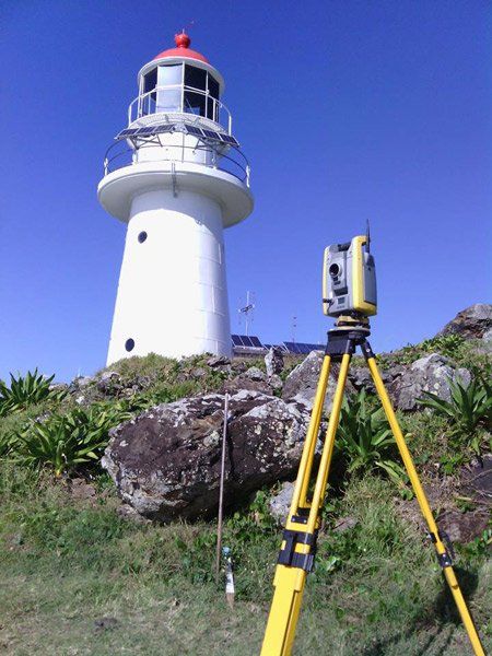 survey equipment by a lighthouse