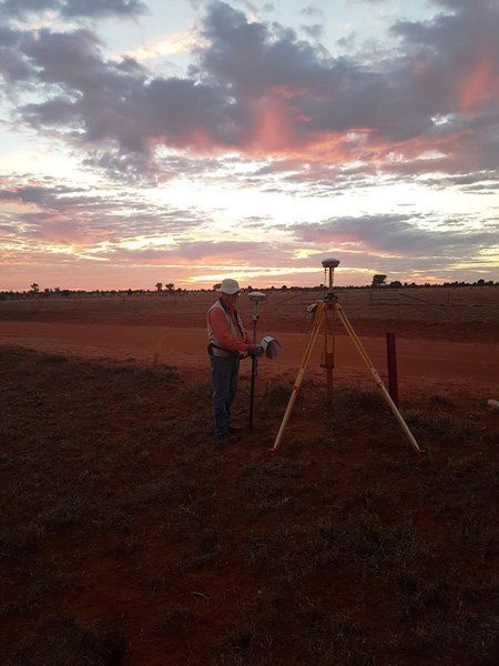 surveying at sunset