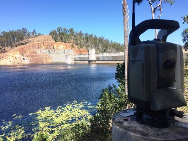 surveying a dam