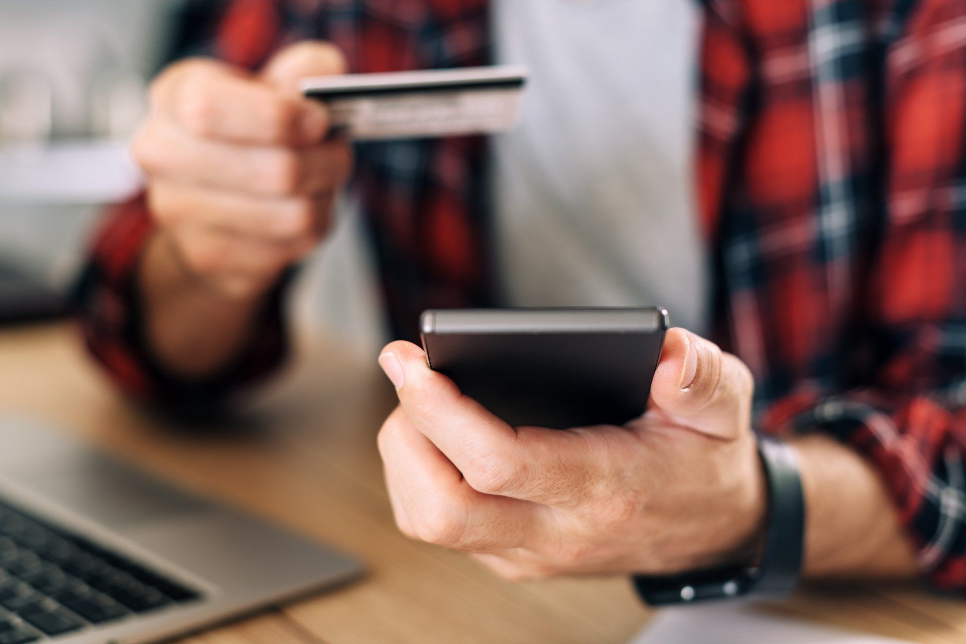A man making a purchase online with his smartphone