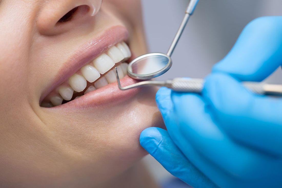 paziente felice dal dentista