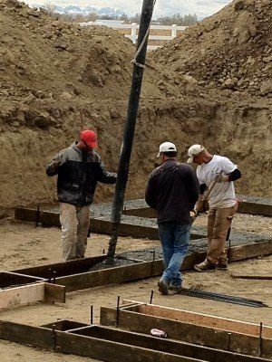 Workers Putting Cement on Frame — Billings, MT — Fleury Concrete