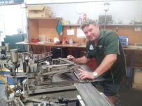 Norm Hyatt Locksmiths employee in shop