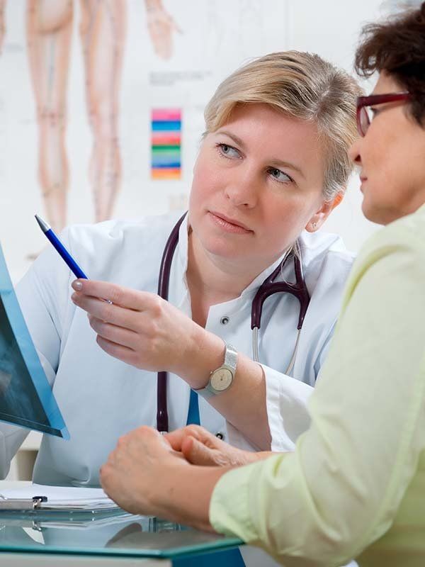 Female doctor consulting at a GP practice