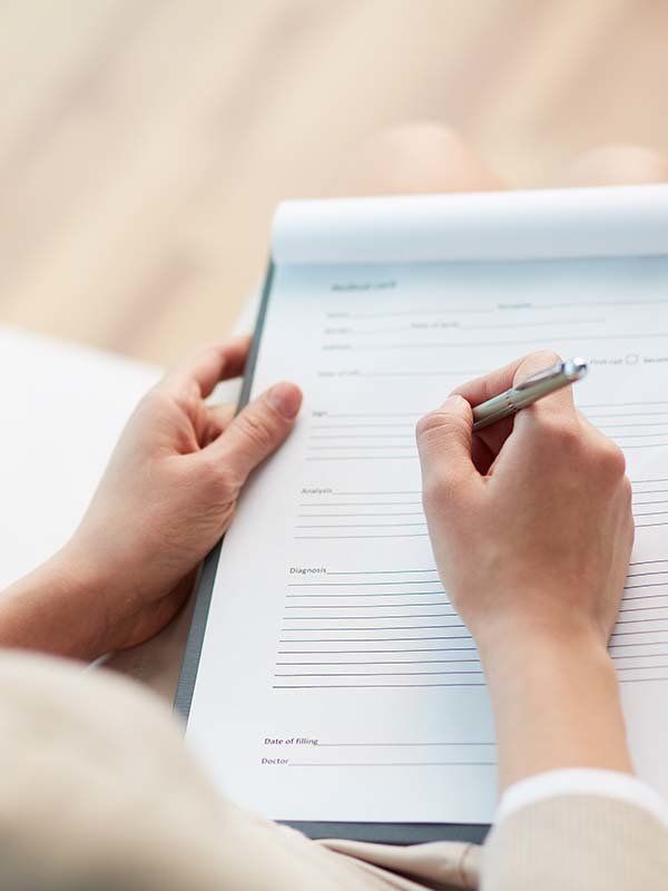 Doctor filling out form