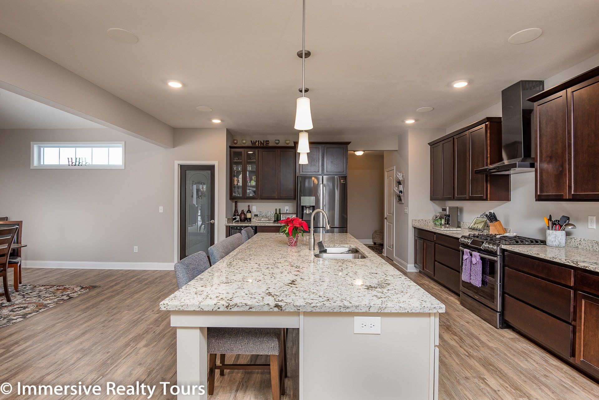 Kitchen with island that has seating