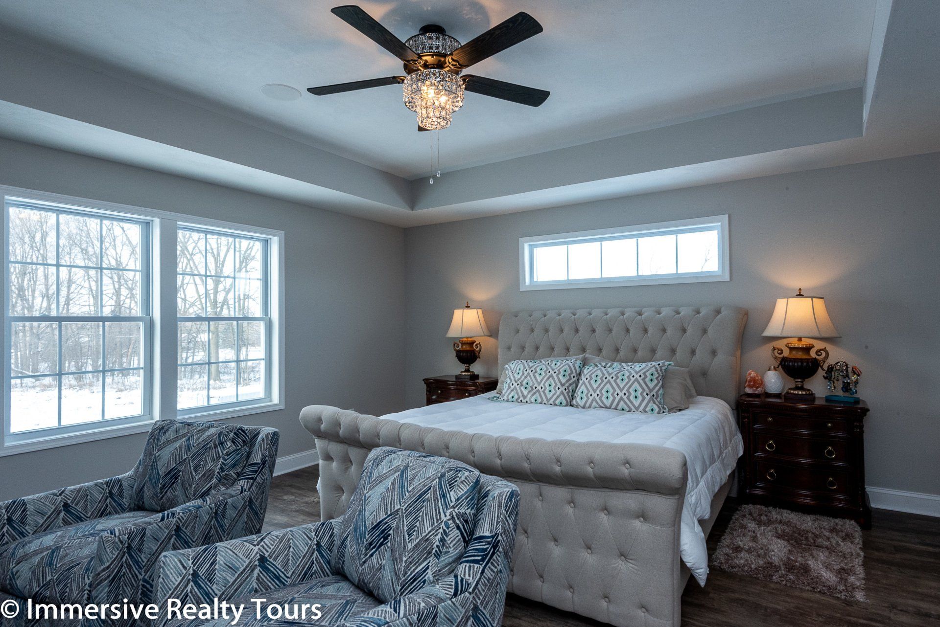 Primary bedroom with recessed ceiling