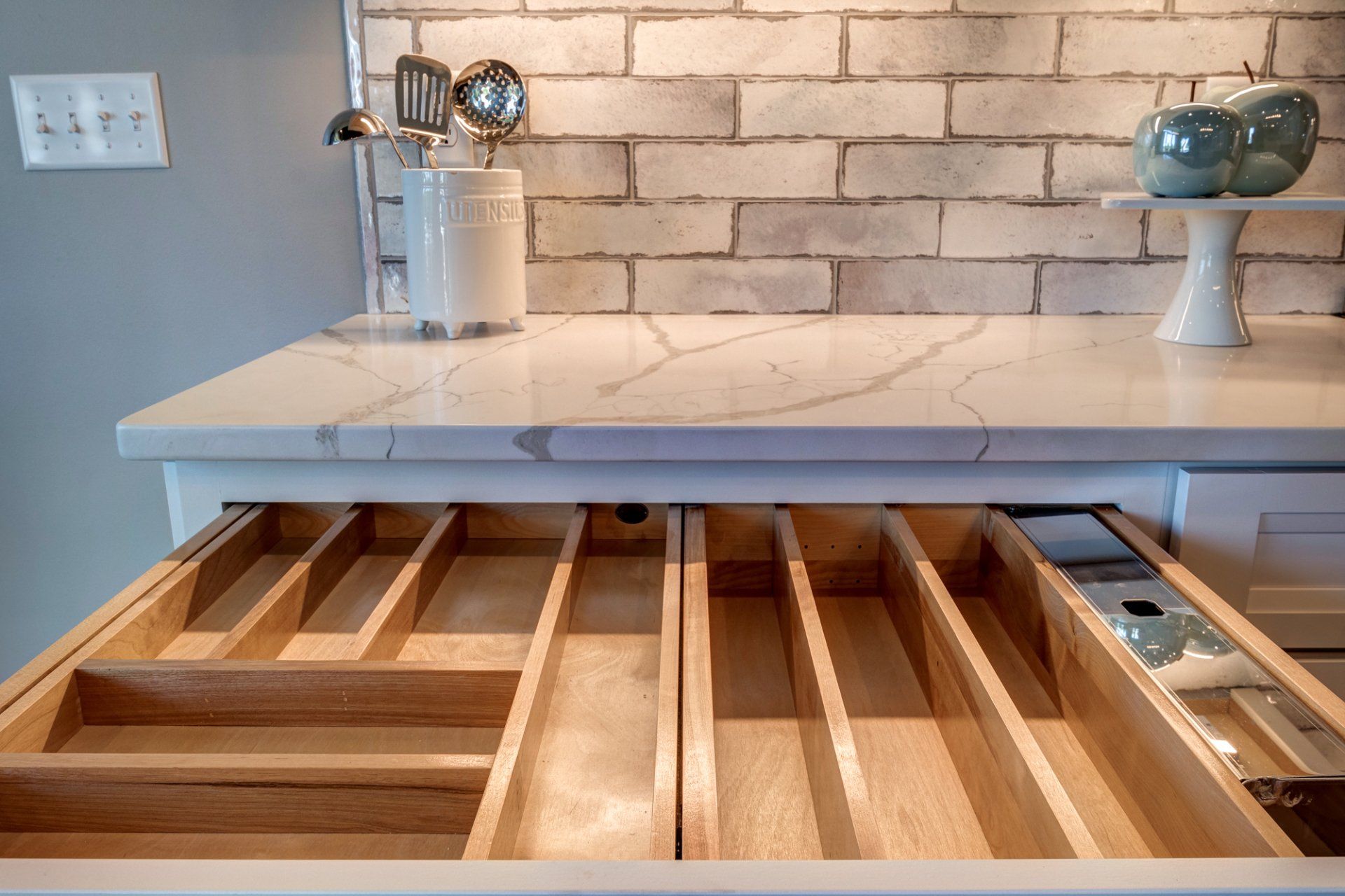 marble countertop and drawers with dividers