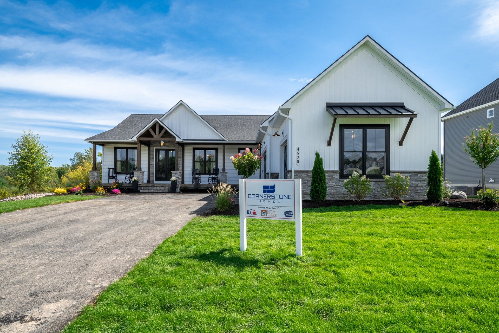 front exterior, yard, and driveway