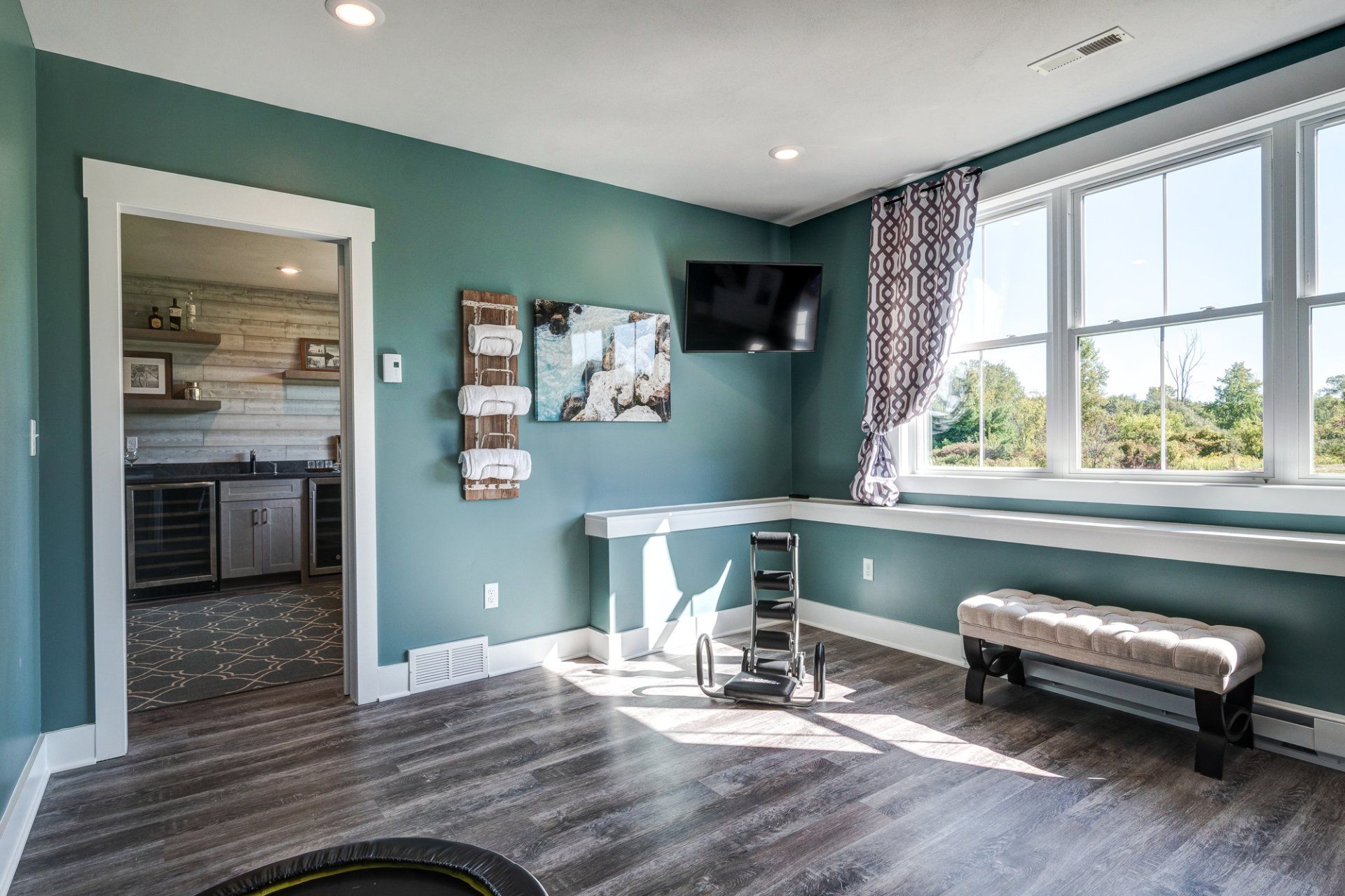 flex room with bar in background