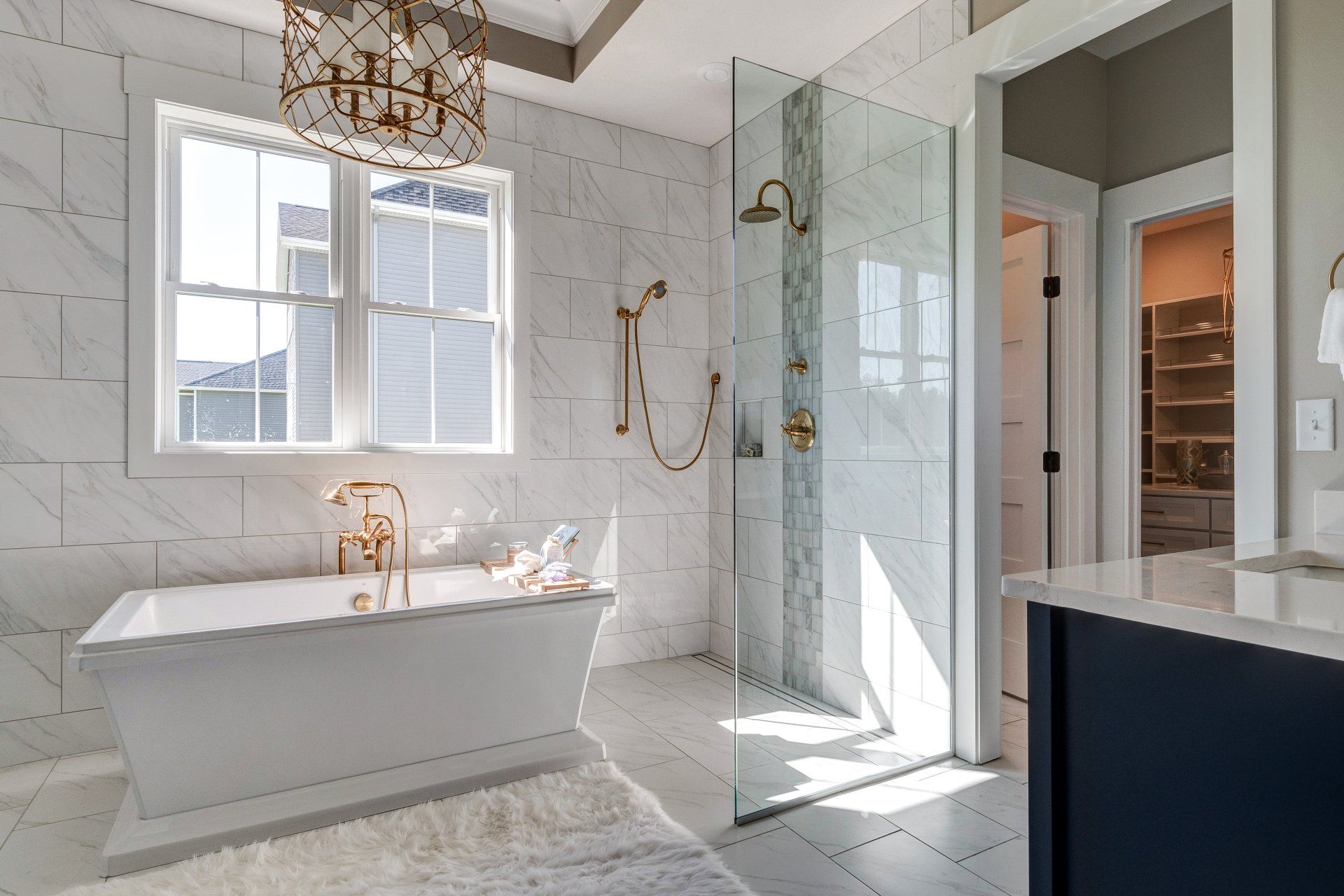 Primary bathroom with separate tub and shower