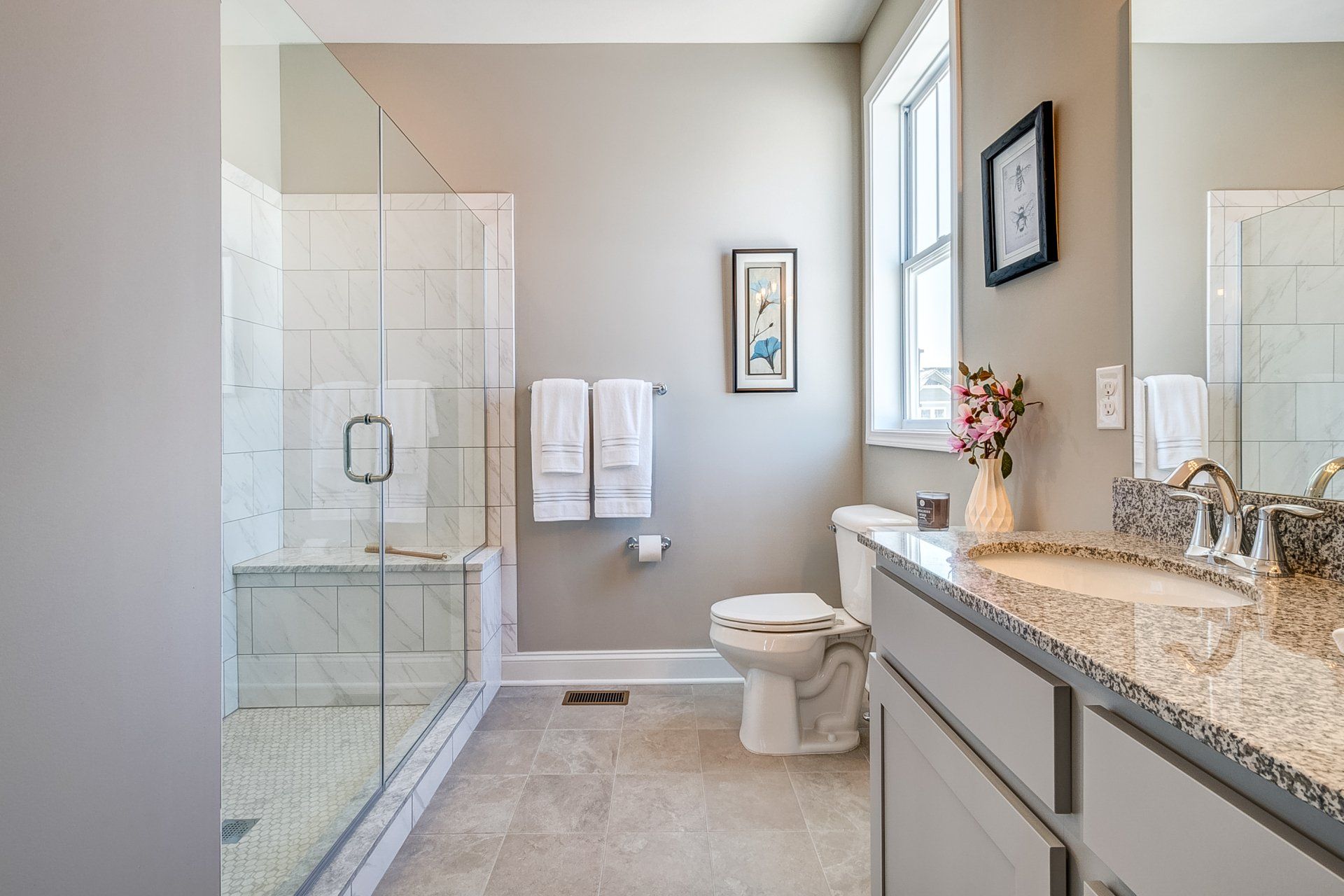 toilet next to double vanity