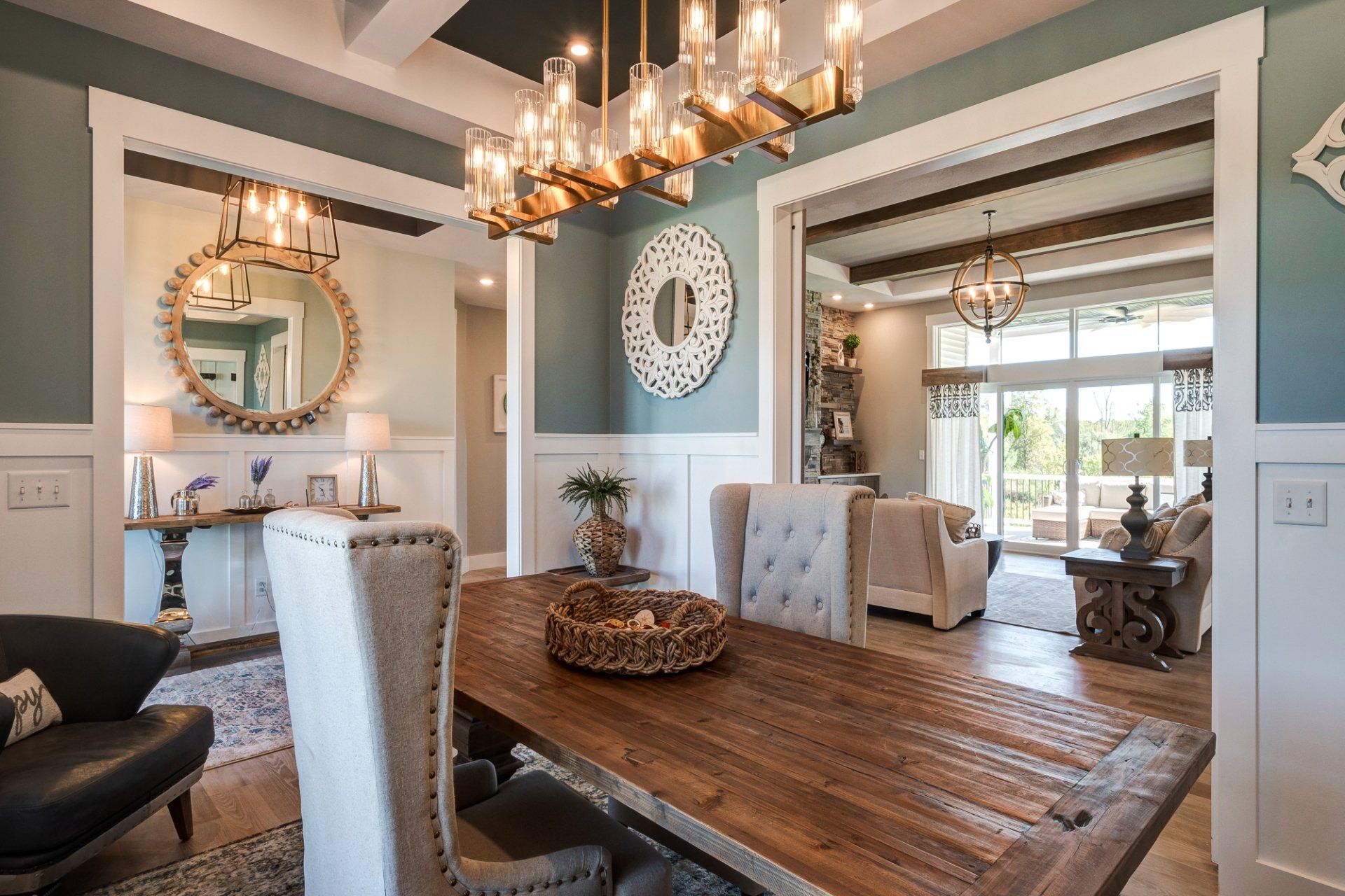 dining room with front entryway and living room in background
