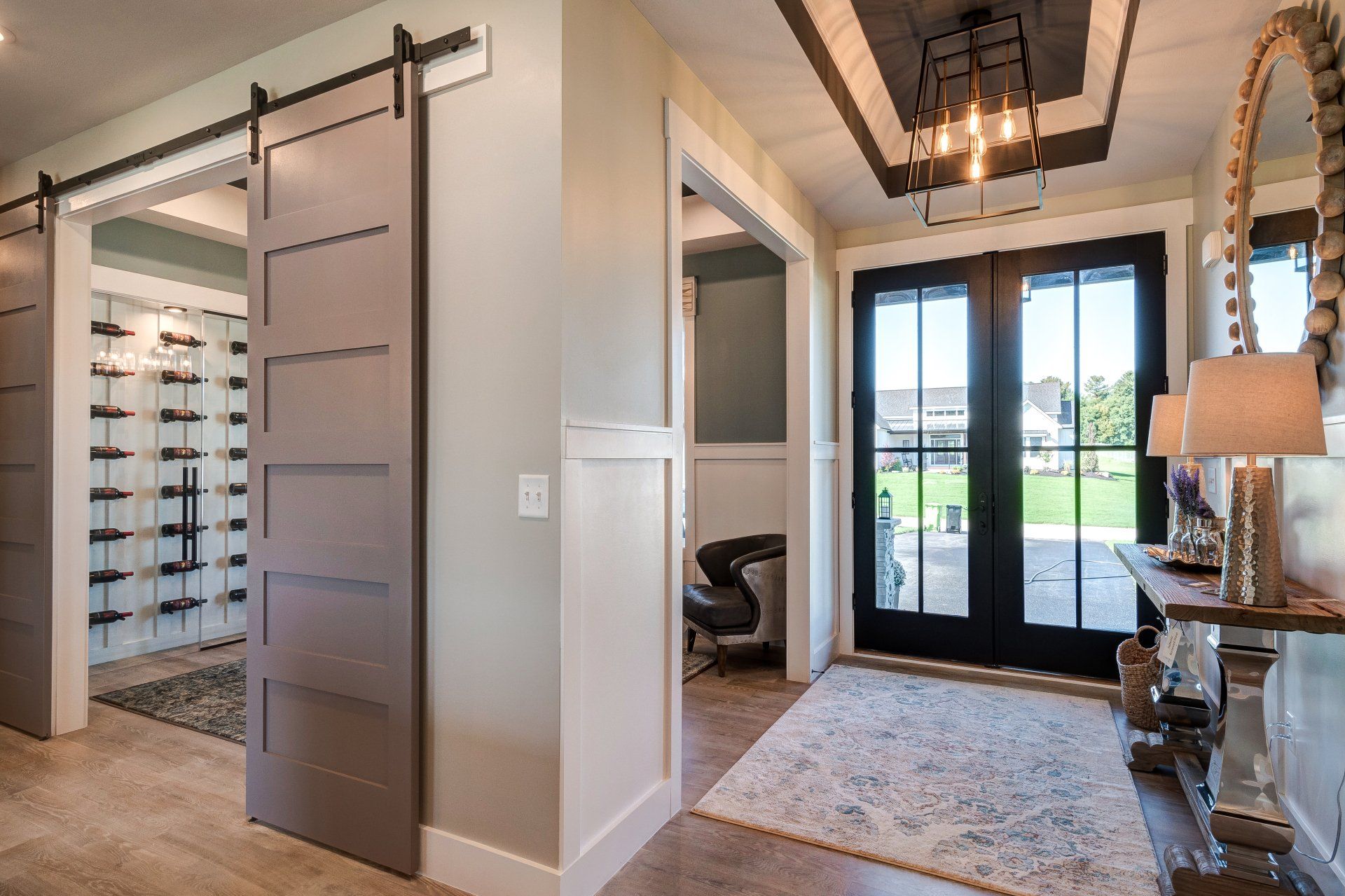 dining room with wine cellar and double sliding barn doors