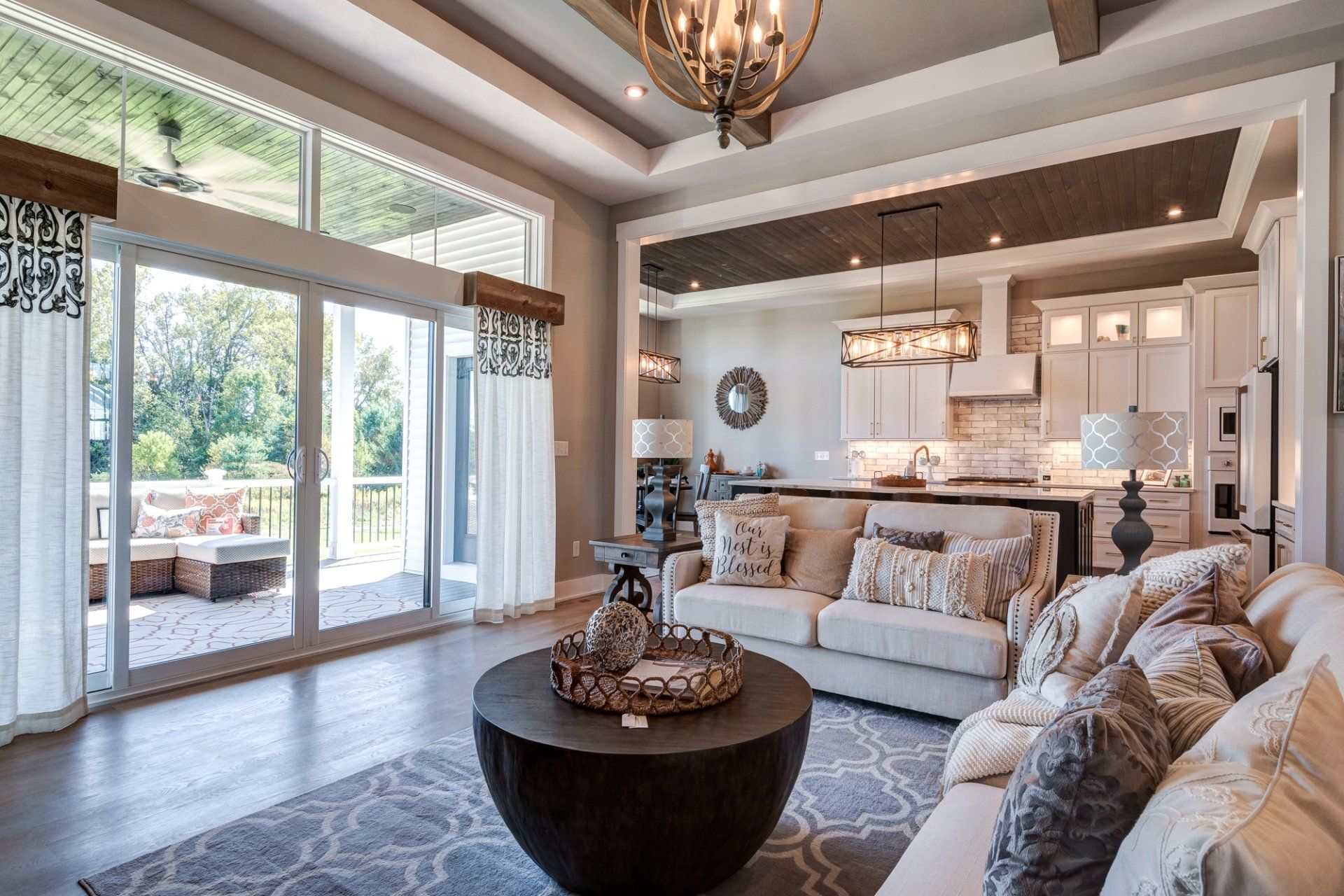 living room with patio access and recessed ceilings