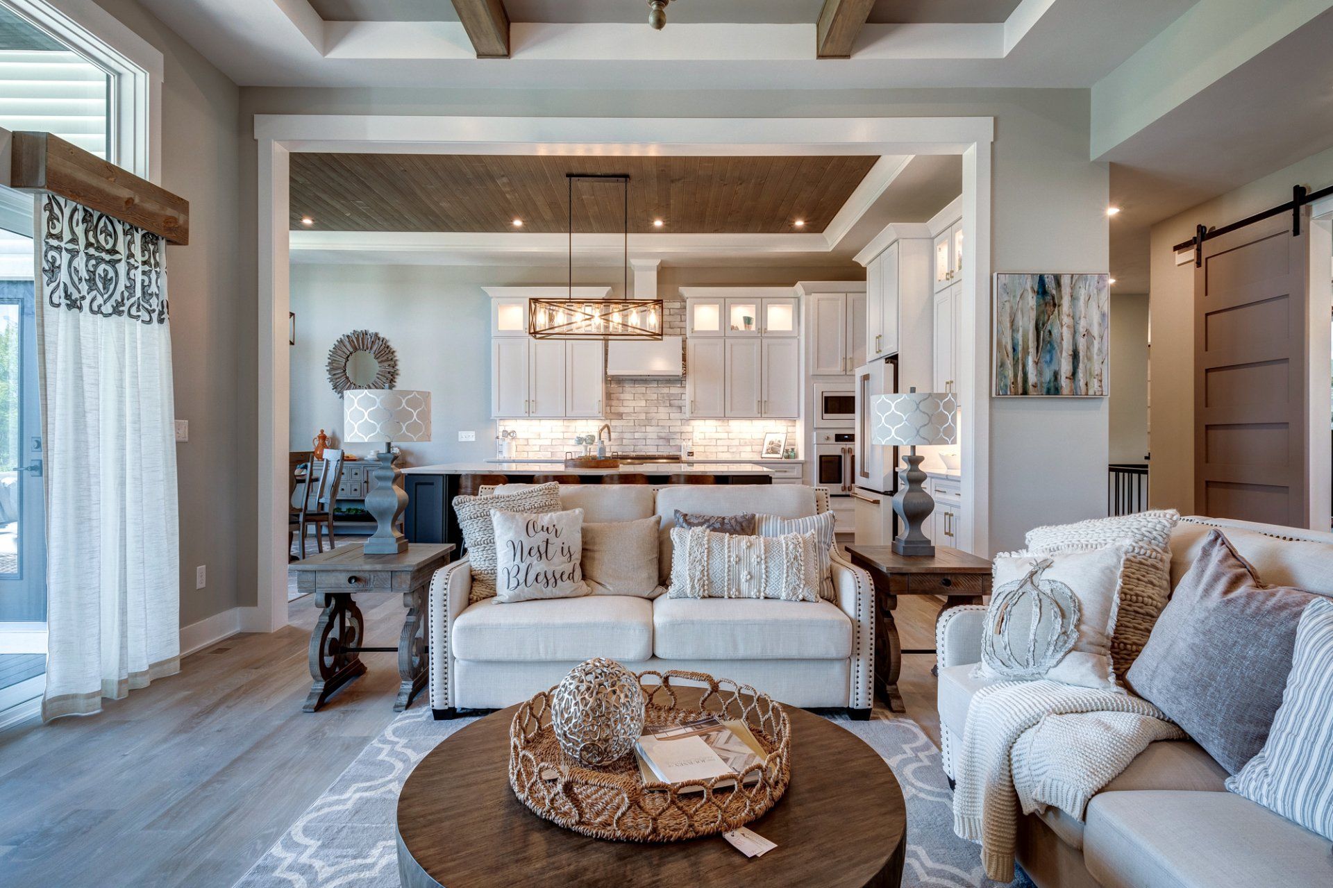 living room with kitchen in background